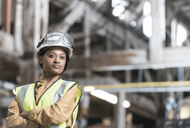 Young woman in a hard hat